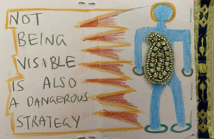 Pencil illustration of a blue stick figure surrounded by fiery orange lines. Written next to them: 'NOT BEING VISIBLE IS ALSO A DANGEROUS STRATEGY'.