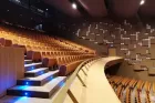 Photo of an empty theatre auditorium.