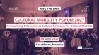 Text of the event on an image of a large group of people around tables talking. 
