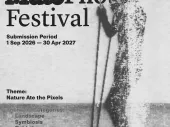 Text of the call with a blurry black and white figure. 