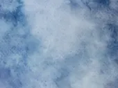 White clouds in a blue sky. 