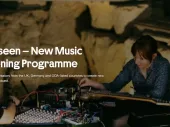 Text of the call over an image of a person with a synthesiser. 