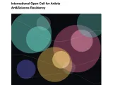 Text of the call with an image of circles representing photoluminescence of perovskite crystals.