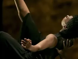 A person being held in the horizontal. 